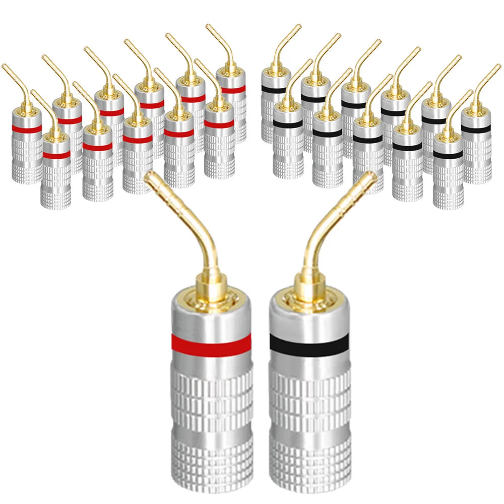 Silver audio speaker connector with 24k gold plated tips and red and black bands for musical sound connection