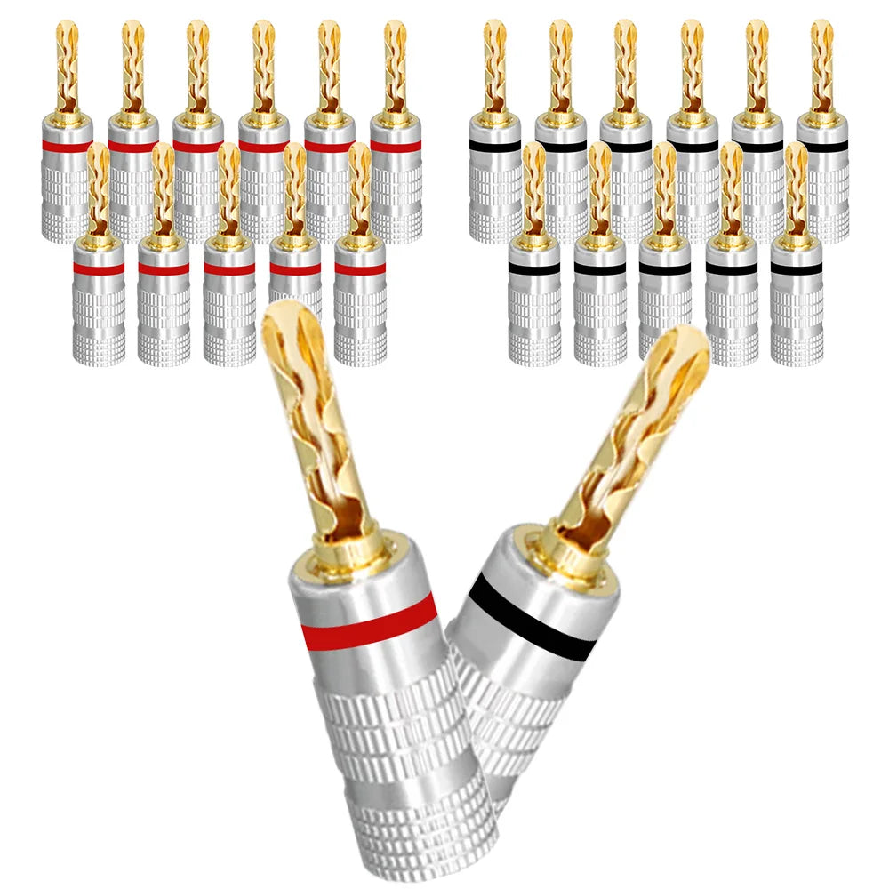 Silver-colored audio speaker connectors with 24k gold plated pins and red black bands for musical sound applications