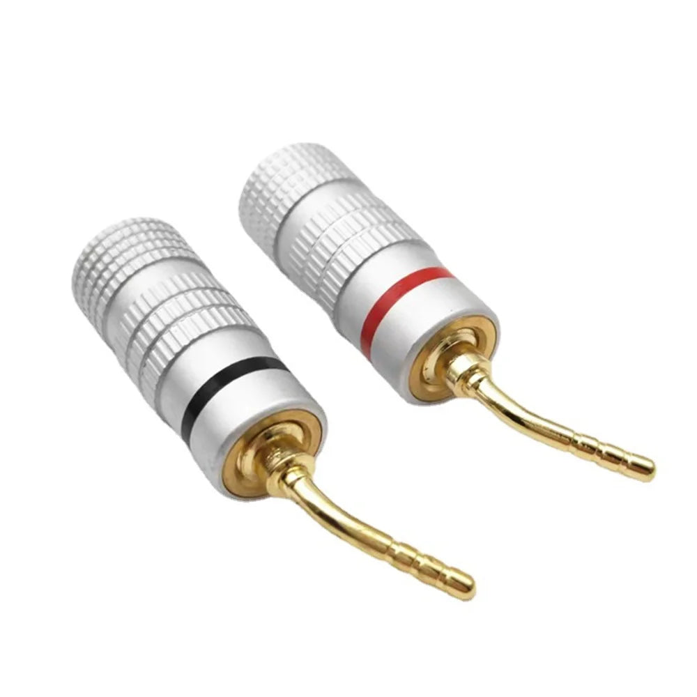 Silver and gold 24k gold plated audio speaker connector binding posts with red and black stripes for musical sound systems
