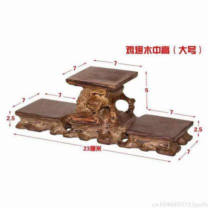 A rustic dark brown natural solid wood decorative shelf with three tiered platforms for buddha vase flower display