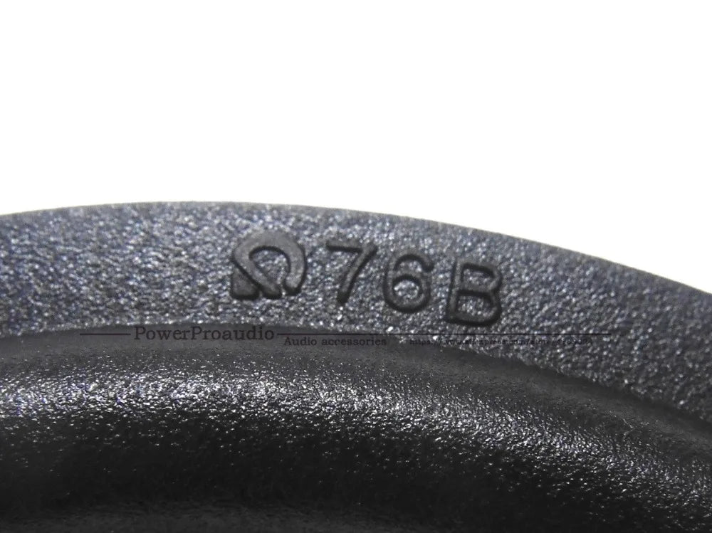 Black textured metal speaker basket with engraved ω76b marking and powerproaudio branding for inch woofer repairable parts