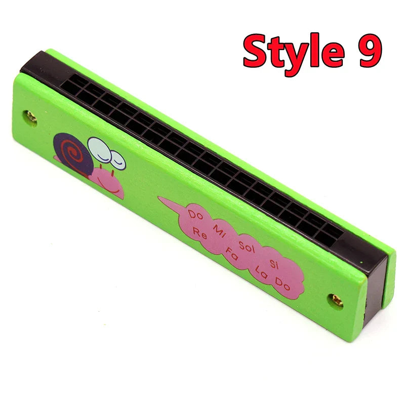 Bright green wooden harmonica musical toy with cartoon snail and pink notes for puzzle early education teaching aids