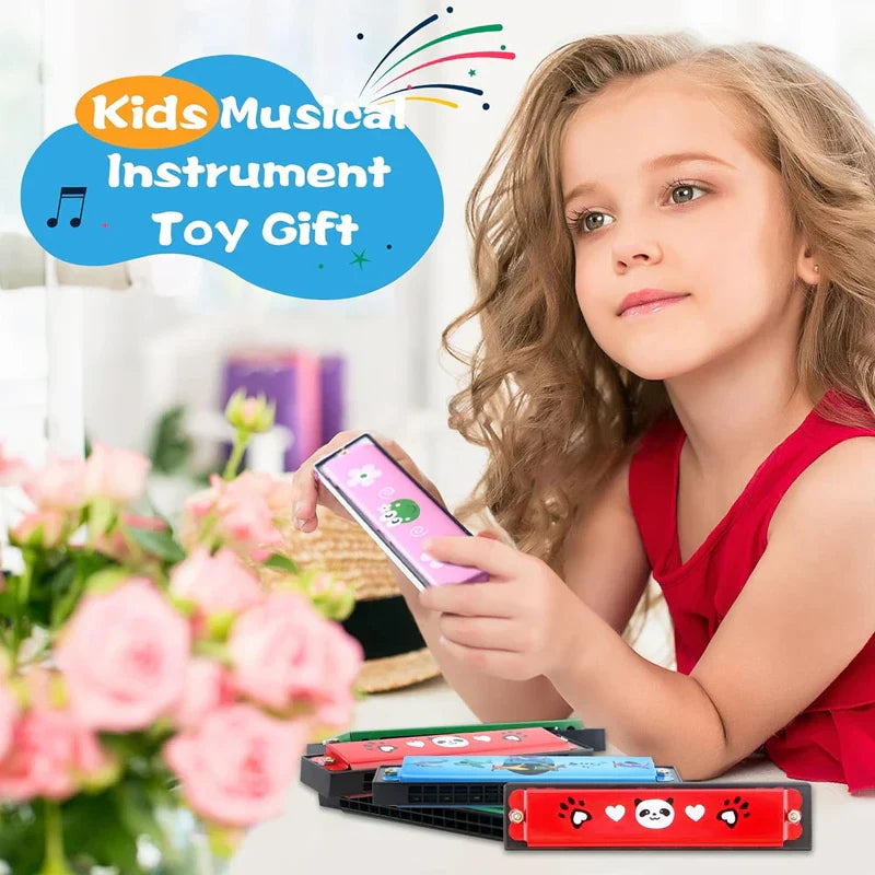 A child holds a pink smartphone near colorful wooden harmonica musical toys for puzzle early education and music teaching