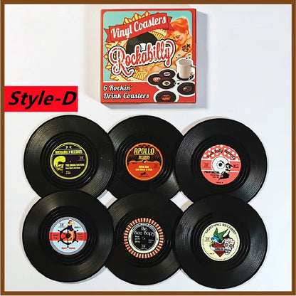 Set of six black retro vinyl record cup coasters with colorful heat resistant music labels for drink mugs
