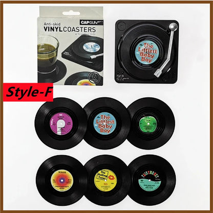 Black retro vinyl record cup coasters with colorful labels and heat resistant music turntable-style holder set
