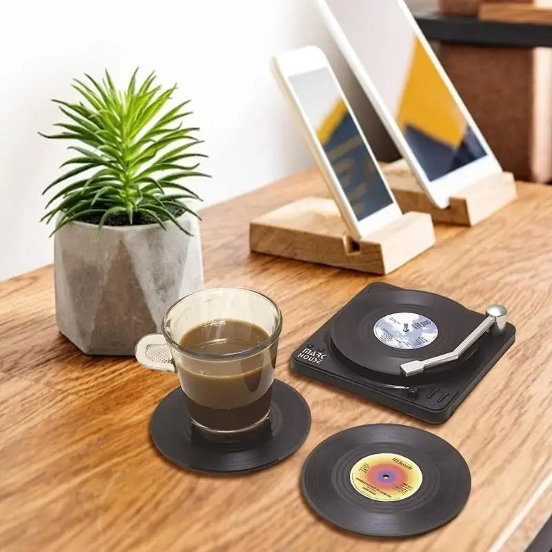 Black vinyl retro vinyl record cup coaster set with miniature turntable design and heat resistant music label details