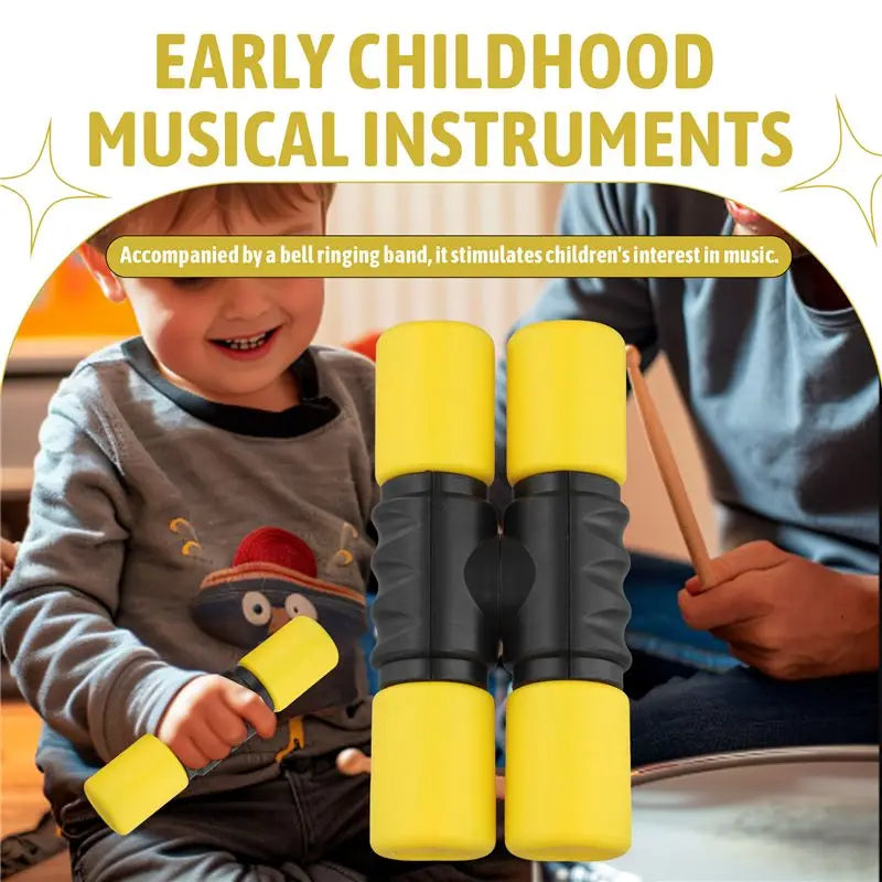Bright yellow and black foam-tipped percussion sticks for early childhood musical play with 1px solid black accents