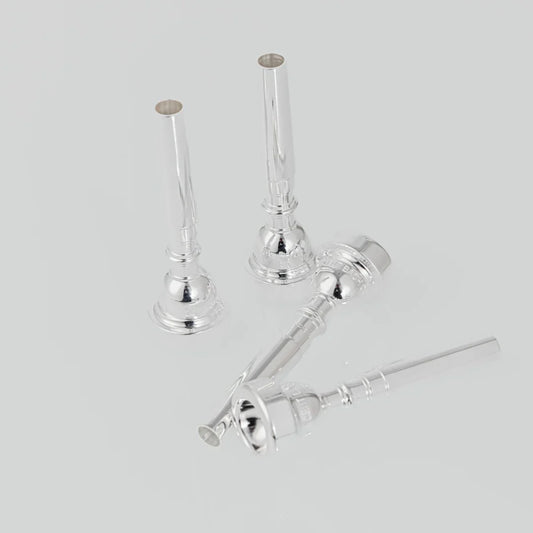 Shiny silver bb trumpet mouthpieces with polished metal finishes in size pro silver and gold plated copper for musical brass instruments