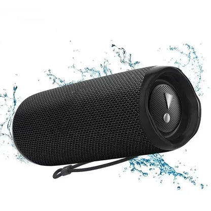 Black textured fabric portable outdoor subwoofer wireless speaker with sleek circular control panel and integrated lanyard