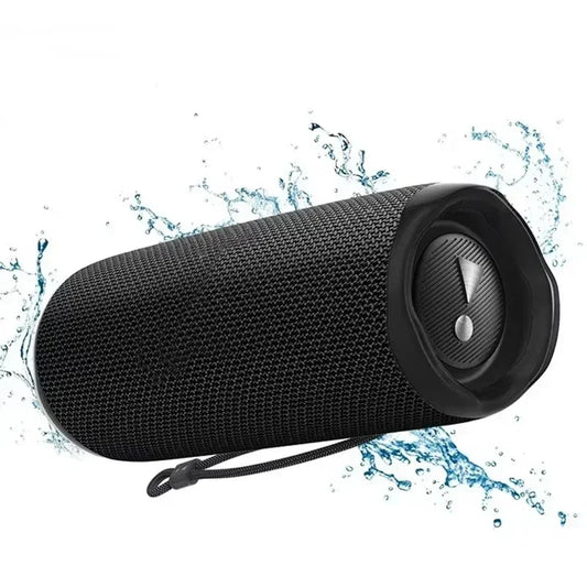 Black textured fabric portable outdoor subwoofer wireless speaker with sleek circular control panel and integrated lanyard