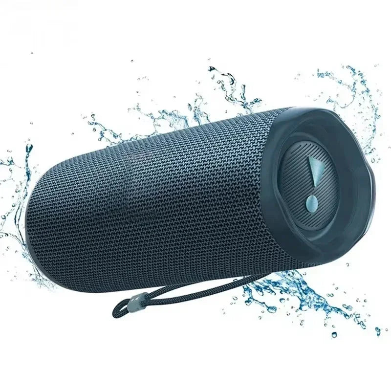 Black mesh portable speaker with cylindrical design and carrying loop for outdoor subwoofer wireless use and universal u disk support