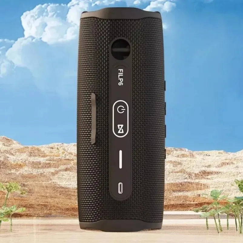 Black textured cylindrical flip 6 portable bluetooth speaker with control buttons for outdoor subwoofer wireless use