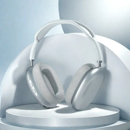 White over-ear bluetooth wireless headset with silver earcups and fabric headband designed for sports gaming and seamless phone connectivity