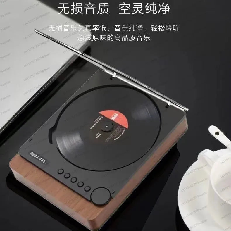 Modern digital turntable with black and wood finish playing red vinyl for hi-fi music and player bluetooth use