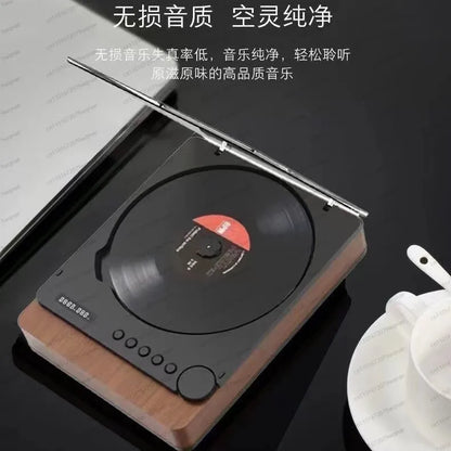 Modern digital turntable with black and wood finish playing red vinyl for hi-fi music and player bluetooth use