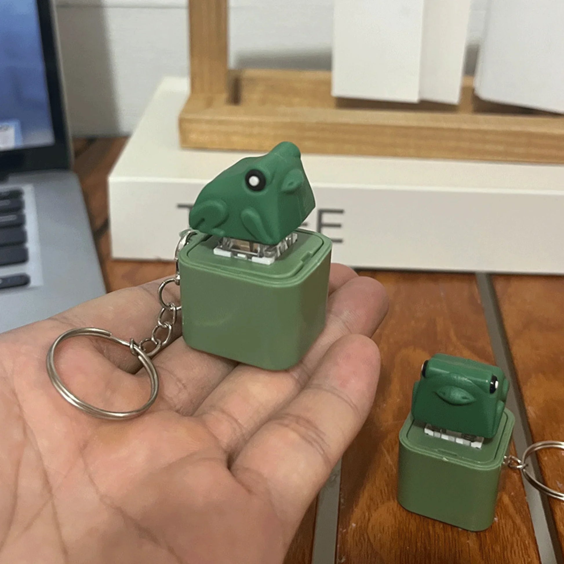 Green frog-shaped usb flash drive with keychain featuring croaking frog keychain and keyboard fidget clicker functions