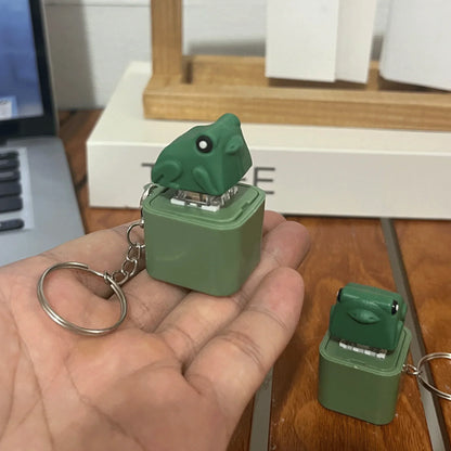 Green frog-shaped usb flash drive with keychain featuring croaking frog keychain and keyboard fidget clicker functions