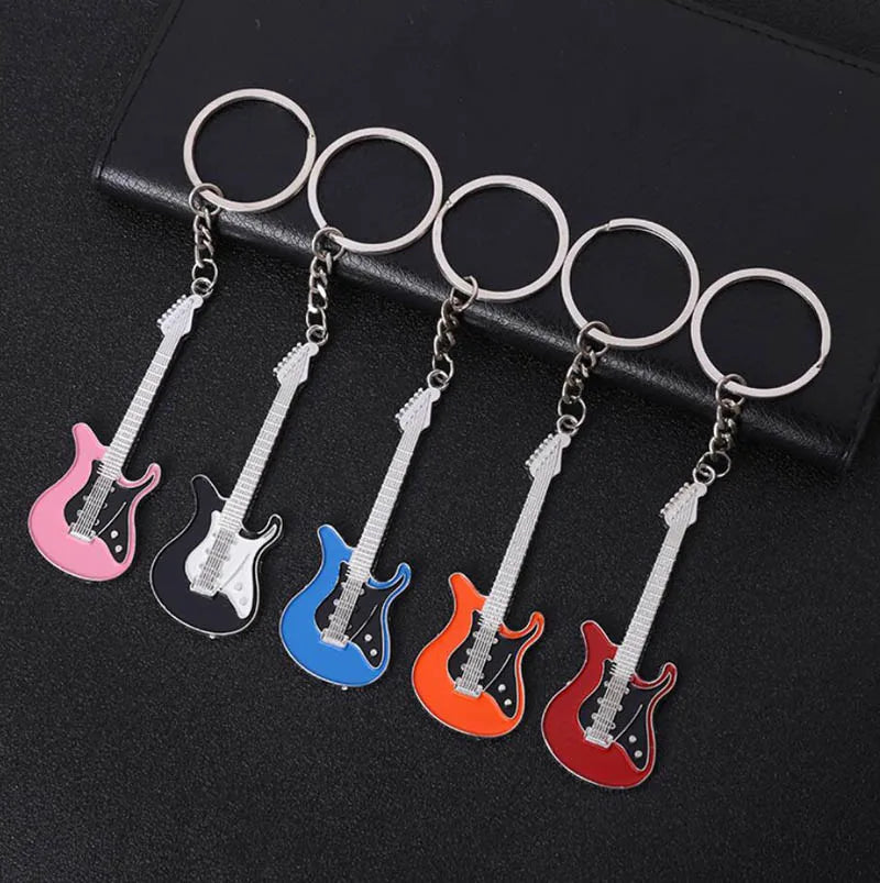Five colorful classic guitar keychains in enamel finish with silver metal rings for car keys and musical instruments gift