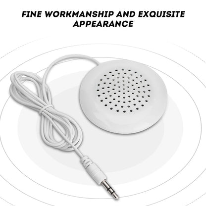 White circular diy pillow speaker with perforated grille and coiled cable for mp3 phone portable use