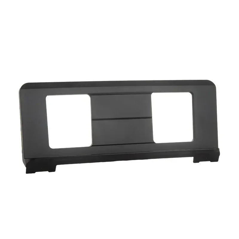 Black plastic car dashboard mount with two rectangular cutouts and central slot for electronic piano music stand use