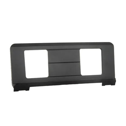 Black plastic car dashboard mount with two rectangular cutouts and central slot for electronic piano music stand use