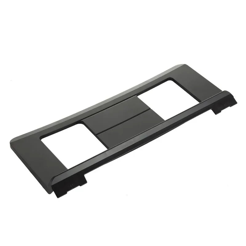 Black plastic electronic piano music stand with two rectangular cutouts and a central slot for portable use