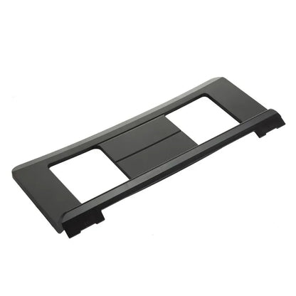 Black plastic electronic piano music stand with two rectangular cutouts and a central slot for portable use