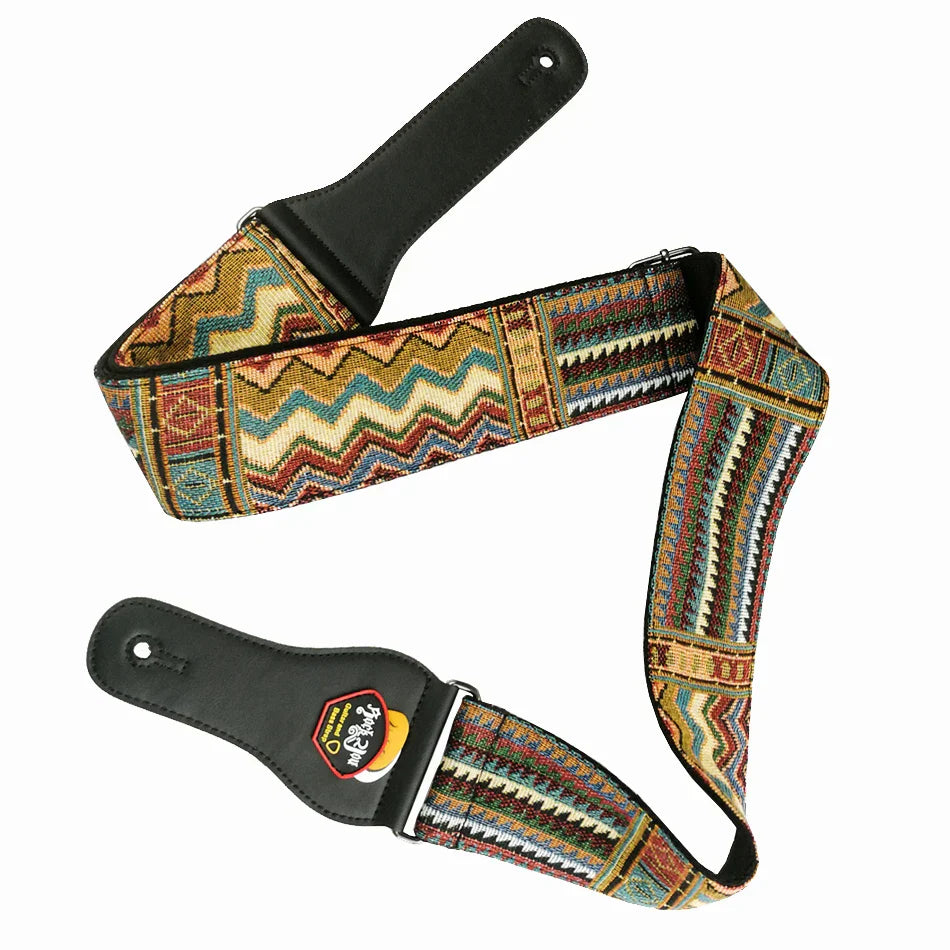 Colorful woven cotton guitar strap with geometric patterns and black leather ends for acoustic and bass guitar use