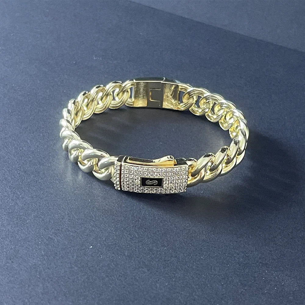 Gold-toned hip hop cuban bracelet monaco with pave-set crystal clasp and black logo 14k gold-plated copper unisex design
