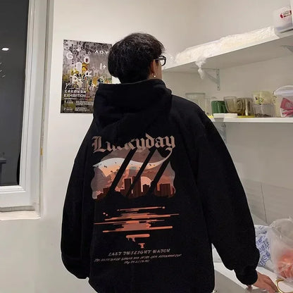 Black cotton fleece hoodie with luckyday graphic and abstract cityscape in pink and orange recommended weight design