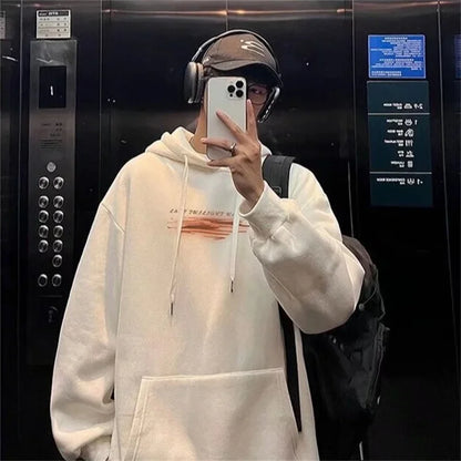 Cream-colored oversized cotton fleece hoodie with subtle horizontal graphic print recommended weight for streetwear use