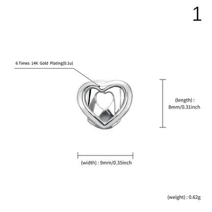 A sleek heart-shaped hollow dental grill with 6 times 14k gold plating for hip hop teeth grills jewelry