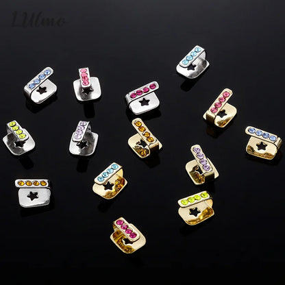 Colorful rhinestone-encrusted silver and gold dental grills jewelry with star cutouts made from high-quality materials