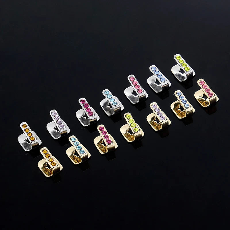 Colorful silver and gold rhinestone-encrusted metal dental grills jewelry for hip hop cosplay and Halloween use