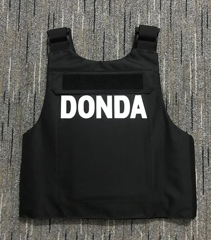 Black tactical hiphop street vest with bold white donda lettering as a strike waistcoat gilet undershirt singlet