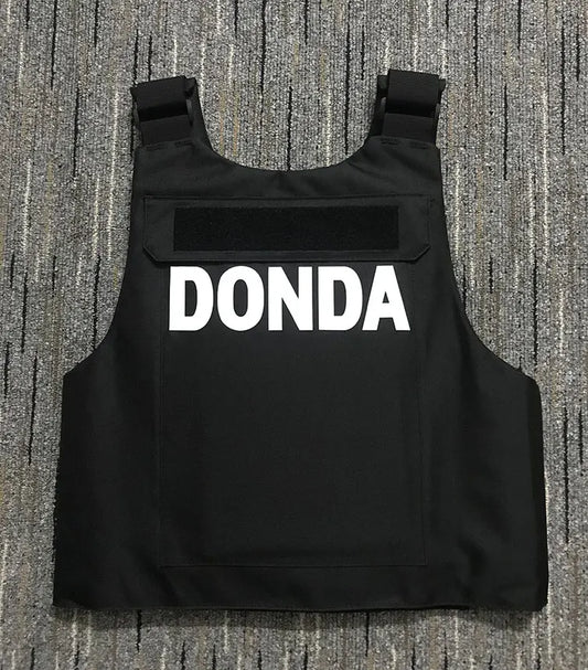 Black tactical hiphop street vest with bold white donda lettering perfect as a strike waistcoat gilet or singlet kanyes hiphop style