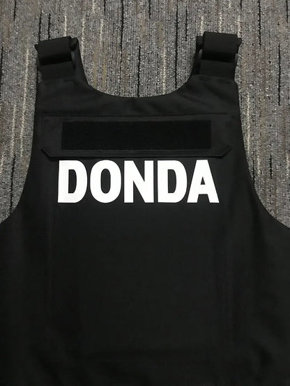 Black tactical hiphop street vest with bold white donda lettering, ideal strike waistcoat gilet and singlet kanyes hiphop style
