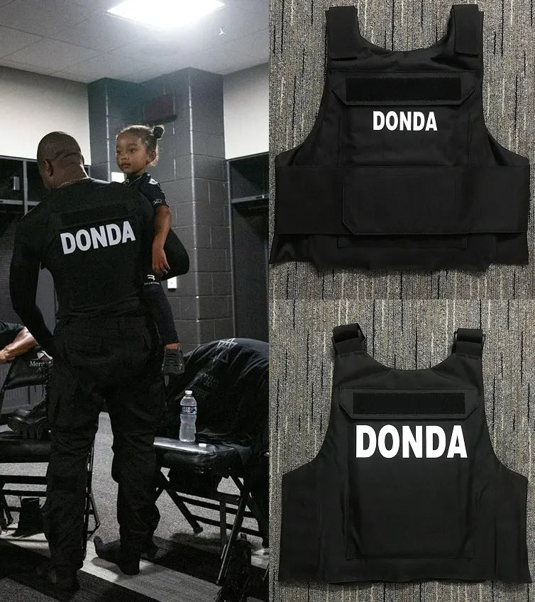 Black tactical vest with white donda lettering across the chest from new icons vests 2022 hiphop streetwear collection