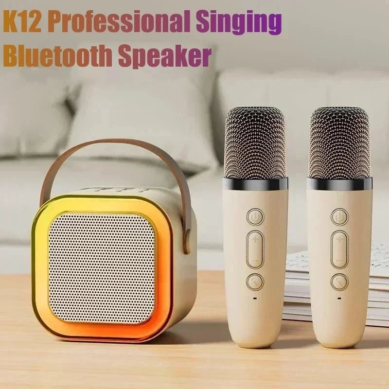 Cream-colored k12 karaoke machine bluetooth speaker with yellow orange gradient border and carrying handle for family singing loudspeaker