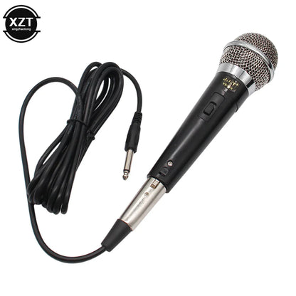 Black karaoke microphone handheld dynamic with silver mesh grille and coiled cable for vocal music performance