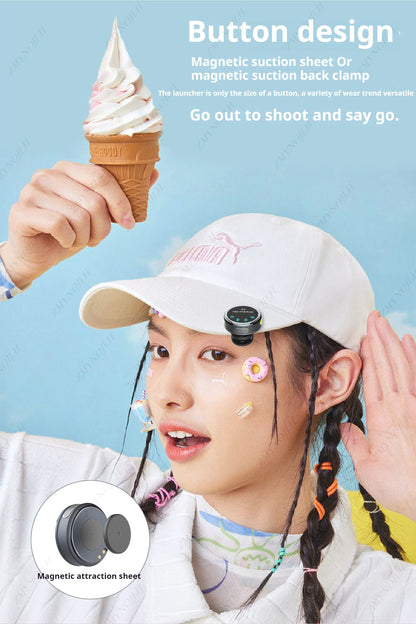 White cap with pink logo and black magnetic wireless lavalier microphone noise canceling button attachment