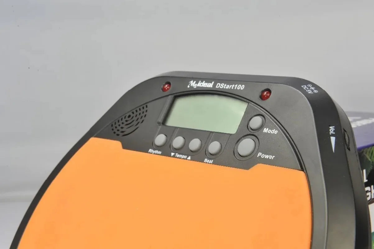 Black and orange meideal portable ds100 electronic drum training pad with digital display rhythm and volume controls