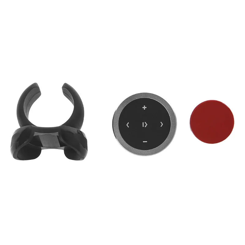 Black glossy plastic music playback remote with silver bezel and circular buttons for wireless bluetooth media control