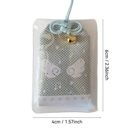 A delicate silver mesh musical notes wings diy embroidery blessings charm with blue cord and golden bell gift keyring key
