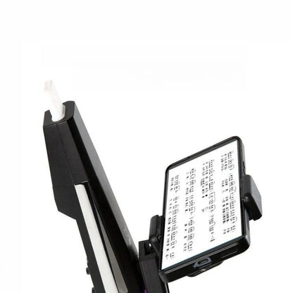 Black music phone stand with white stylus holding iphone displaying sheet music for outdoor performances trumpet clarinet