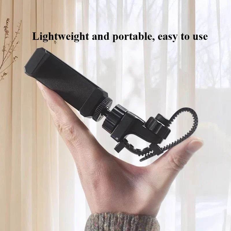 Black compact music phone stand with adjustable clamp and coiled cable for outdoor performances trumpet clarinet