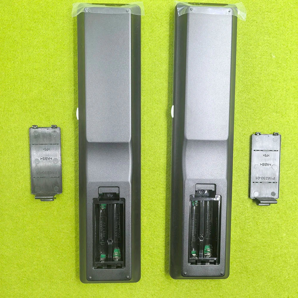 Two identical black plastic remote control rc036sr rc043sr for marantz sr7013 sr7012 sr7015 compatible receivers back view with battery covers