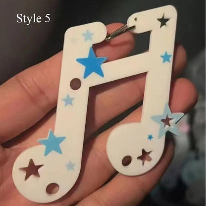 White acrylic resin music note keychain with blue and dark star cutouts for bags creative bag or phone pendant backpack