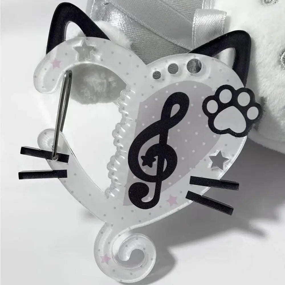 Clear acrylic cat-shaped hair clip with black ears and whiskers featuring a resin music note design for bags creative bag use