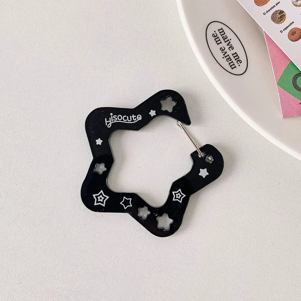 Black star-shaped resin music note clip with white star cutouts and hisocute engraving for bags creative bag charm
